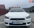 Белый Мицубиси Лансер, объемом двигателя 1.47 л и пробегом 196 тыс. км за 6900 $, фото 1 на Automoto.ua