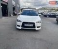 Белый Мицубиси Лансер, объемом двигателя 2 л и пробегом 190 тыс. км за 6400 $, фото 7 на Automoto.ua