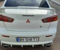 Белый Мицубиси Лансер, объемом двигателя 1.5 л и пробегом 182 тыс. км за 7100 $, фото 2 на Automoto.ua