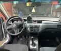 Білий Міцубісі Lancer, об'ємом двигуна 1.58 л та пробігом 250 тис. км за 4400 $, фото 4 на Automoto.ua