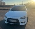 Белый Мицубиси Лансер, объемом двигателя 1.5 л и пробегом 245 тыс. км за 5500 $, фото 1 на Automoto.ua