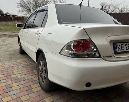 Белый Мицубиси Лансер, объемом двигателя 1.58 л и пробегом 285 тыс. км за 3500 $, фото 3 на Automoto.ua