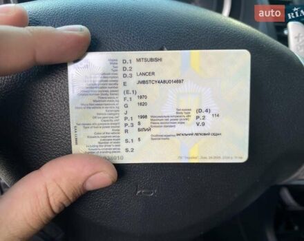 Белый Мицубиси Лансер, объемом двигателя 2 л и пробегом 190 тыс. км за 6400 $, фото 10 на Automoto.ua