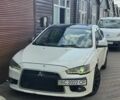 Белый Мицубиси Лансер, объемом двигателя 2 л и пробегом 302 тыс. км за 4000 $, фото 1 на Automoto.ua
