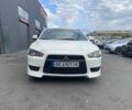 Білий Міцубісі Lancer, об'ємом двигуна 2 л та пробігом 3 тис. км за 6500 $, фото 7 на Automoto.ua