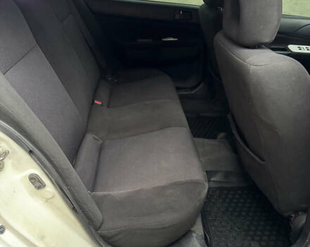 Белый Мицубиси Лансер, объемом двигателя 1.58 л и пробегом 285 тыс. км за 3500 $, фото 12 на Automoto.ua