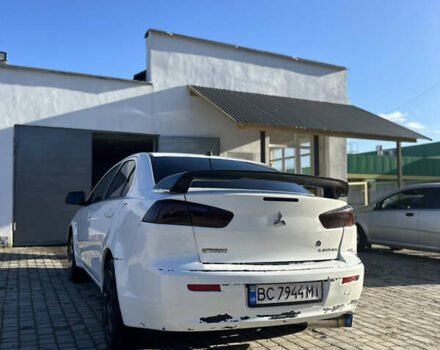 Белый Мицубиси Лансер, объемом двигателя 1.5 л и пробегом 255 тыс. км за 5777 $, фото 5 на Automoto.ua