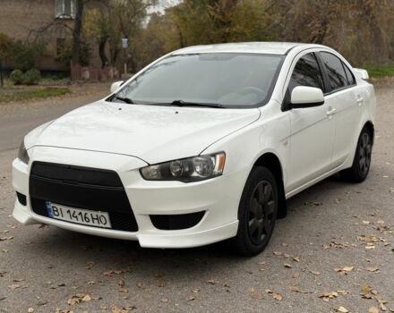 Белый Мицубиси Лансер, объемом двигателя 1.5 л и пробегом 265 тыс. км за 5600 $, фото 1 на Automoto.ua