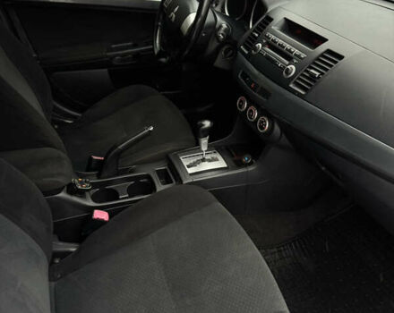 Белый Мицубиси Лансер, объемом двигателя 1.47 л и пробегом 230 тыс. км за 5800 $, фото 18 на Automoto.ua