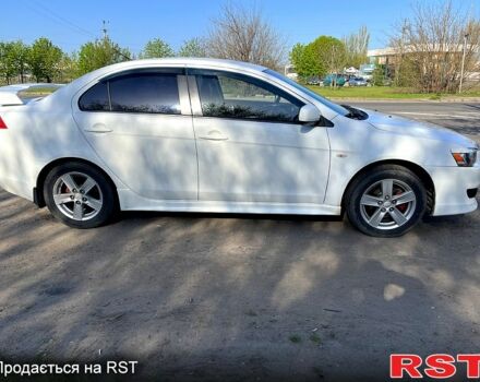 Белый Мицубиси Лансер, объемом двигателя 2 л и пробегом 230 тыс. км за 6700 $, фото 5 на Automoto.ua