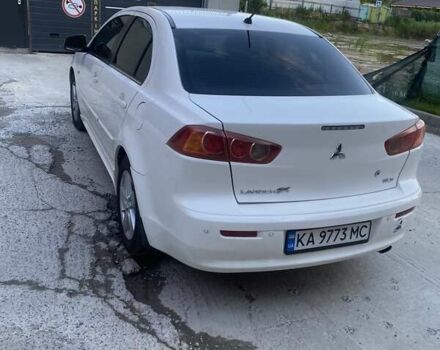 Белый Мицубиси Лансер, объемом двигателя 2 л и пробегом 167 тыс. км за 7400 $, фото 9 на Automoto.ua