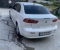 Белый Мицубиси Лансер, объемом двигателя 2 л и пробегом 167 тыс. км за 7400 $, фото 9 на Automoto.ua
