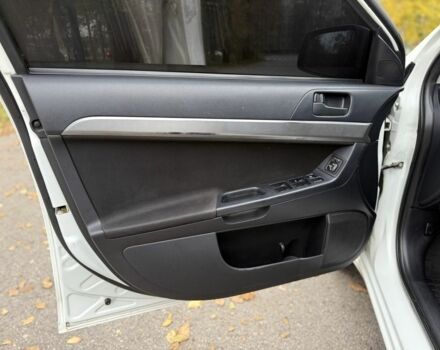 Белый Мицубиси Лансер, объемом двигателя 1.5 л и пробегом 265 тыс. км за 5600 $, фото 19 на Automoto.ua