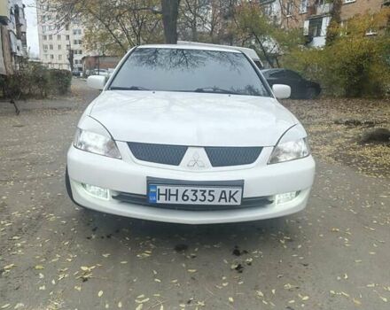 Белый Мицубиси Лансер, объемом двигателя 1.59 л и пробегом 222 тыс. км за 4950 $, фото 5 на Automoto.ua