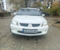 Белый Мицубиси Лансер, объемом двигателя 1.59 л и пробегом 222 тыс. км за 4950 $, фото 5 на Automoto.ua