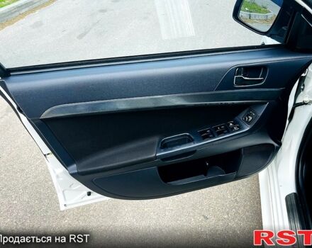 Белый Мицубиси Лансер, объемом двигателя 2 л и пробегом 185 тыс. км за 7999 $, фото 11 на Automoto.ua