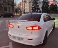 Белый Мицубиси Лансер, объемом двигателя 2 л и пробегом 208 тыс. км за 7000 $, фото 4 на Automoto.ua