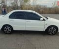 Білий Міцубісі Lancer, об'ємом двигуна 1.58 л та пробігом 250 тис. км за 4400 $, фото 7 на Automoto.ua