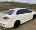 Білий Міцубісі Lancer, об'ємом двигуна 2 л та пробігом 290 тис. км за 5000 $, фото 3 на Automoto.ua