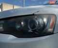Білий Міцубісі Lancer, об'ємом двигуна 2 л та пробігом 289 тис. км за 5500 $, фото 25 на Automoto.ua