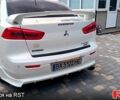 Білий Міцубісі Lancer, об'ємом двигуна 2 л та пробігом 258 тис. км за 6400 $, фото 6 на Automoto.ua