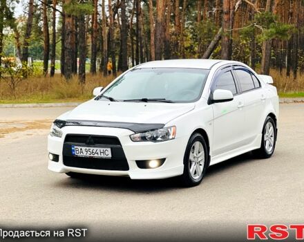 Белый Мицубиси Лансер, объемом двигателя 2 л и пробегом 185 тыс. км за 7999 $, фото 1 на Automoto.ua