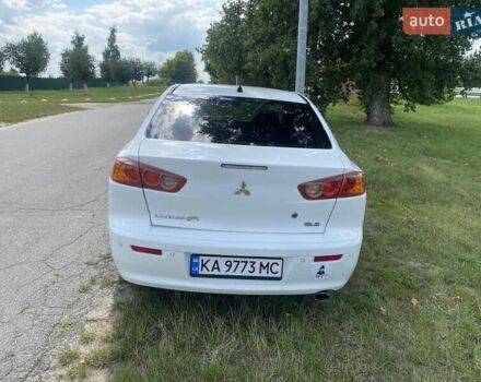 Белый Мицубиси Лансер, объемом двигателя 2 л и пробегом 167 тыс. км за 7400 $, фото 19 на Automoto.ua