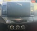 Білий Міцубісі Lancer, об'ємом двигуна 2 л та пробігом 287 тис. км за 5900 $, фото 13 на Automoto.ua
