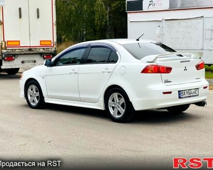 Белый Мицубиси Лансер, объемом двигателя 2 л и пробегом 185 тыс. км за 7999 $, фото 3 на Automoto.ua
