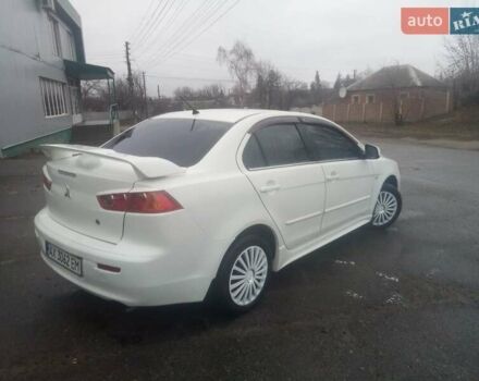 Белый Мицубиси Лансер, объемом двигателя 1.58 л и пробегом 158 тыс. км за 6500 $, фото 1 на Automoto.ua