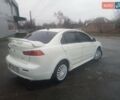 Белый Мицубиси Лансер, объемом двигателя 1.58 л и пробегом 158 тыс. км за 6500 $, фото 1 на Automoto.ua