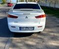 Белый Мицубиси Лансер, объемом двигателя 2 л и пробегом 230 тыс. км за 6700 $, фото 2 на Automoto.ua