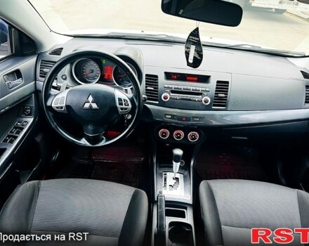 Белый Мицубиси Лансер, объемом двигателя 2 л и пробегом 185 тыс. км за 7999 $, фото 10 на Automoto.ua