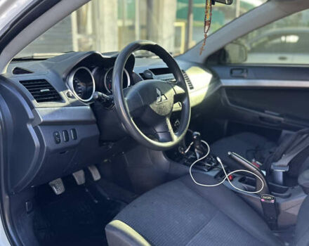 Белый Мицубиси Лансер, объемом двигателя 1.5 л и пробегом 255 тыс. км за 5777 $, фото 7 на Automoto.ua