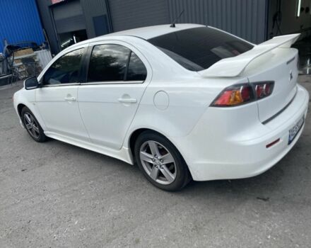 Білий Міцубісі Lancer, об'ємом двигуна 2 л та пробігом 3 тис. км за 6500 $, фото 3 на Automoto.ua