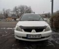 Білий Міцубісі Lancer, об'ємом двигуна 0 л та пробігом 265 тис. км за 5500 $, фото 1 на Automoto.ua