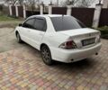 Білий Міцубісі Lancer, об'ємом двигуна 1.6 л та пробігом 285 тис. км за 3500 $, фото 2 на Automoto.ua
