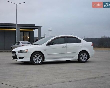 Белый Мицубиси Лансер, объемом двигателя 2 л и пробегом 218 тыс. км за 5555 $, фото 3 на Automoto.ua