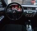 Белый Мицубиси Лансер, объемом двигателя 1.6 л и пробегом 59 тыс. км за 6700 $, фото 50 на Automoto.ua