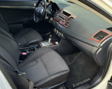 Білий Міцубісі Lancer, об'ємом двигуна 2 л та пробігом 269 тис. км за 6000 $, фото 31 на Automoto.ua