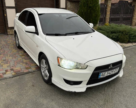 Білий Міцубісі Lancer, об'ємом двигуна 2 л та пробігом 269 тис. км за 6000 $, фото 11 на Automoto.ua