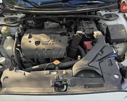 Білий Міцубісі Lancer, об'ємом двигуна 2 л та пробігом 185 тис. км за 7600 $, фото 15 на Automoto.ua