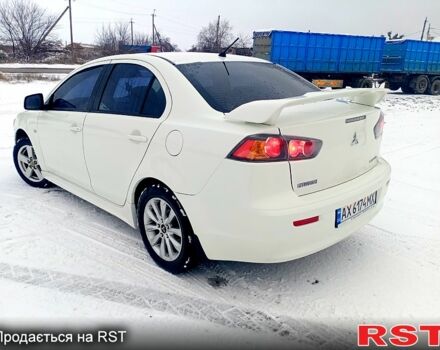 Білий Міцубісі Lancer, об'ємом двигуна 2 л та пробігом 210 тис. км за 7500 $, фото 3 на Automoto.ua