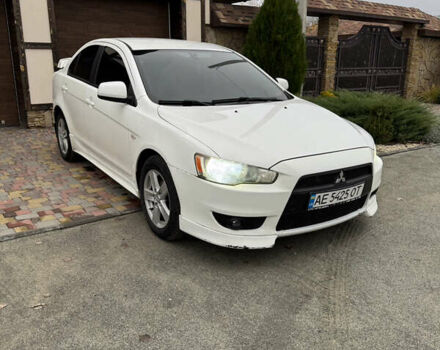 Білий Міцубісі Lancer, об'ємом двигуна 2 л та пробігом 269 тис. км за 6000 $, фото 10 на Automoto.ua