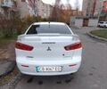 Білий Міцубісі Lancer, об'ємом двигуна 2 л та пробігом 209 тис. км за 7500 $, фото 2 на Automoto.ua