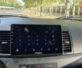Білий Міцубісі Lancer, об'ємом двигуна 2 л та пробігом 185 тис. км за 7600 $, фото 14 на Automoto.ua