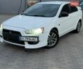 Белый Мицубиси Лансер, объемом двигателя 2 л и пробегом 256 тыс. км за 5700 $, фото 1 на Automoto.ua