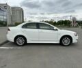 Білий Міцубісі Lancer, об'ємом двигуна 2 л та пробігом 158 тис. км за 6650 $, фото 9 на Automoto.ua