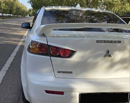 Білий Міцубісі Lancer, об'ємом двигуна 2 л та пробігом 185 тис. км за 7600 $, фото 5 на Automoto.ua