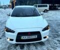 Білий Міцубісі Lancer, об'ємом двигуна 2 л та пробігом 185 тис. км за 7600 $, фото 1 на Automoto.ua